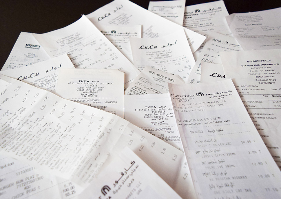 Pile of paper receipts from retail purchases
